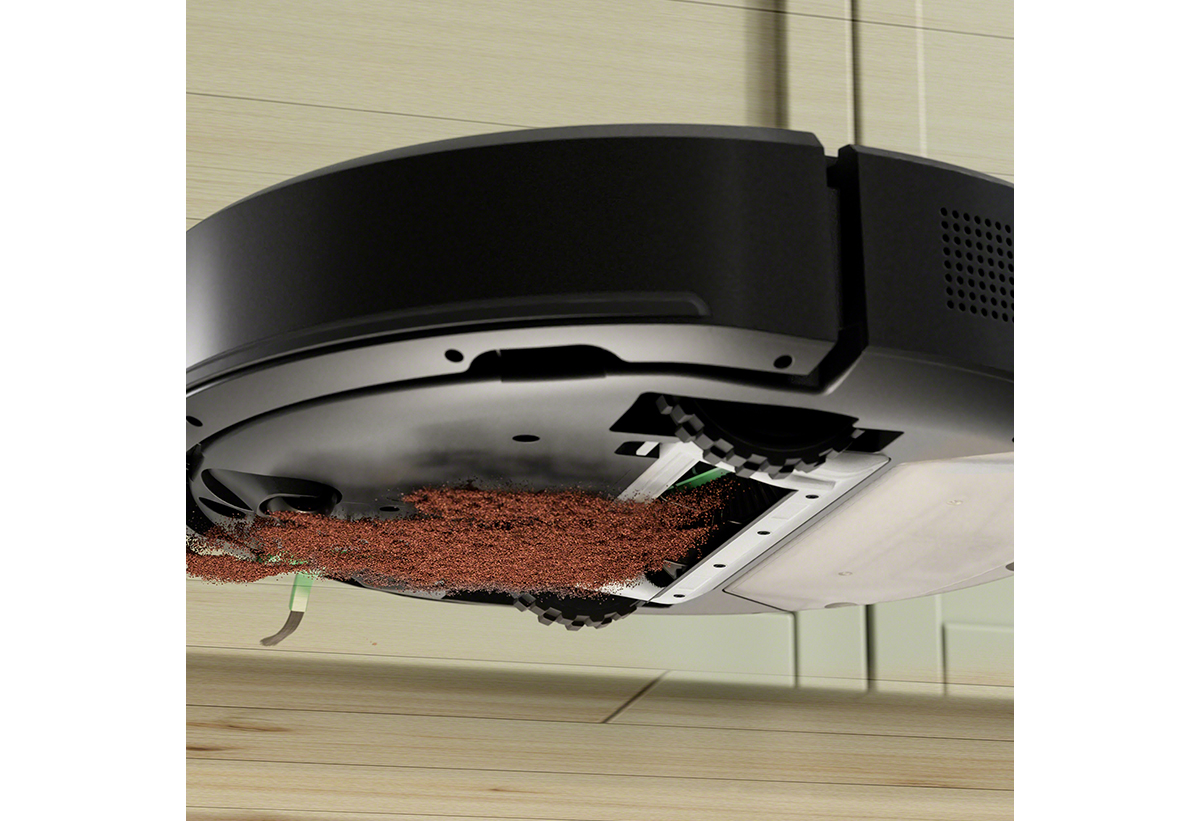 Φαίνεται η σκούπα να αποροφά σκόνη και βρωμίες από το πάτωμα.